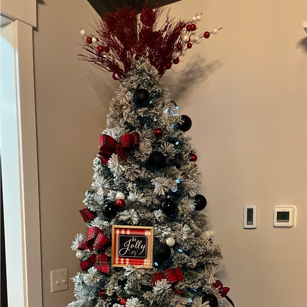 Packing up all items on tree (bulbs, signs, topper, ribbon). NOT THE TREE